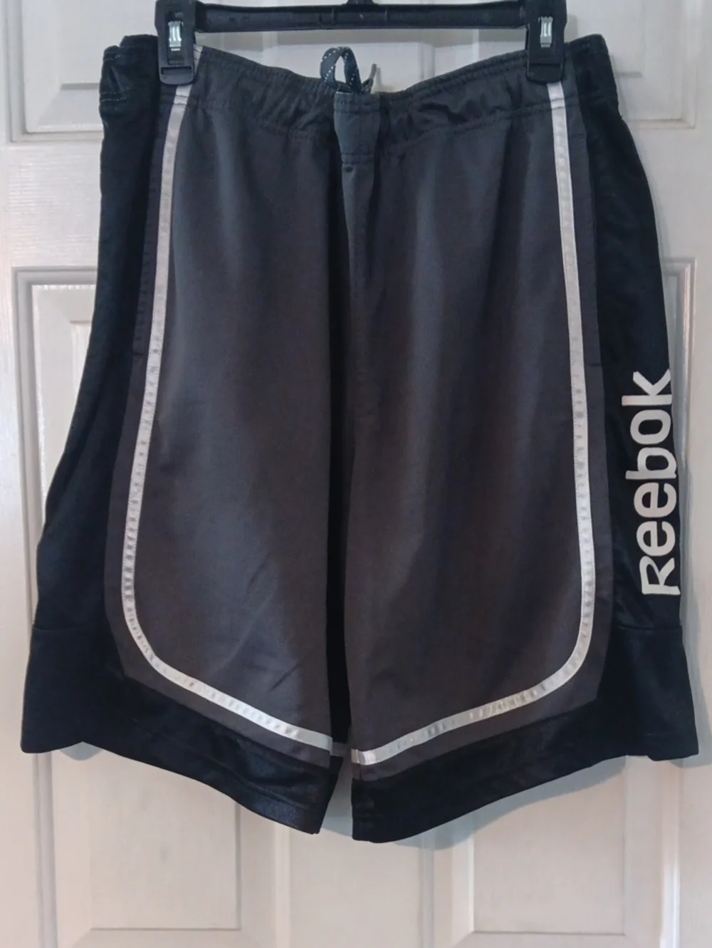 Reebok Men’s Black and Gray Athletic Shorts with Reflective Trim